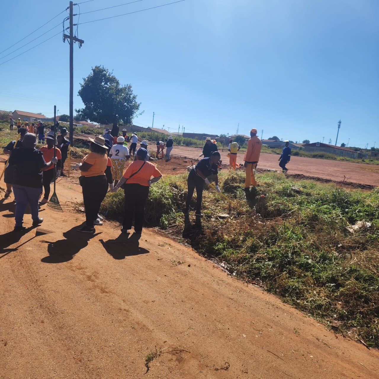 Residents clean up Drieziek 4 Sports Grounds ahead of the Simon Molefe Easter Tournament