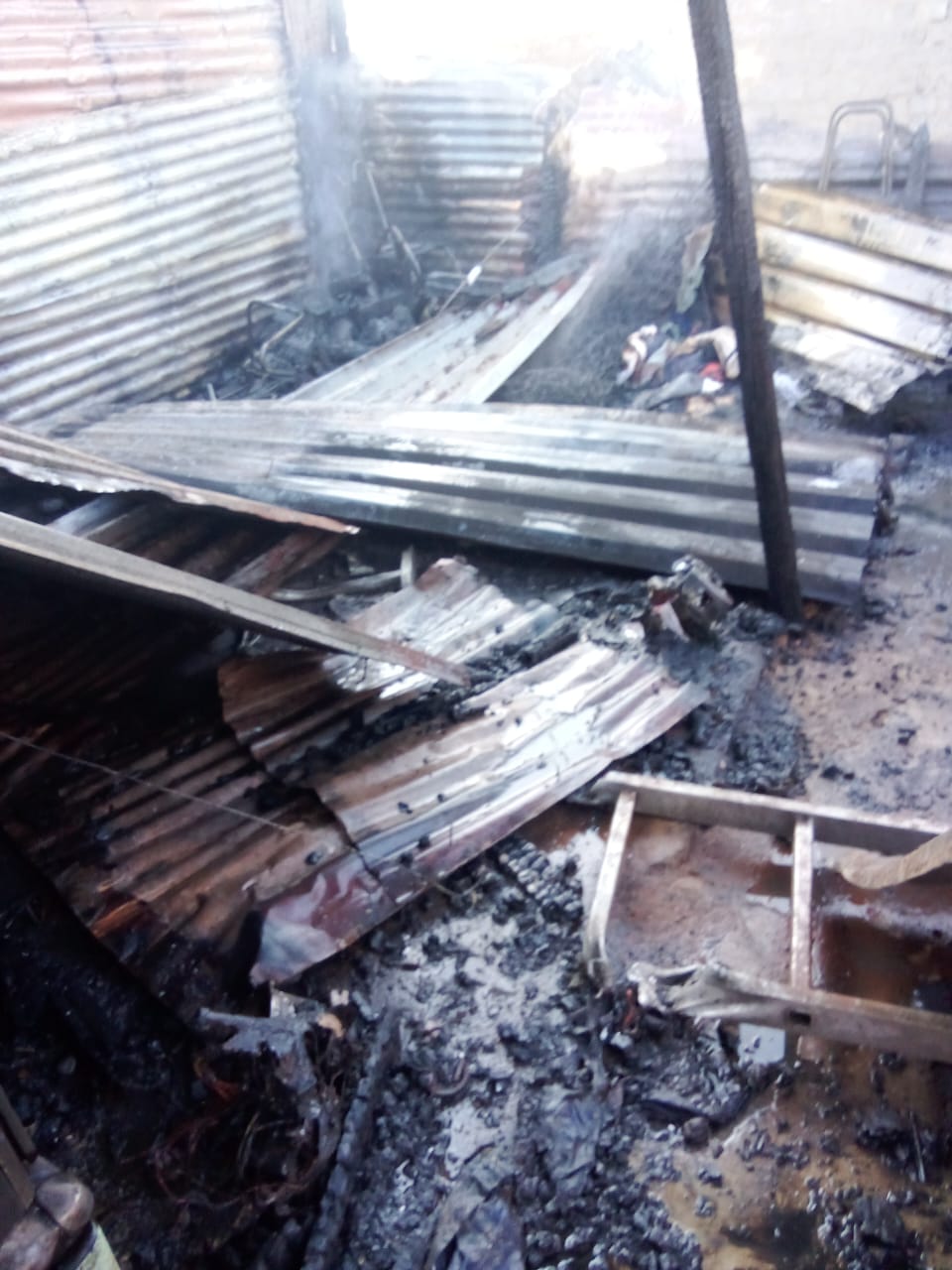 Altercation over stolen car wires allegedly sparks arson in Phase 2