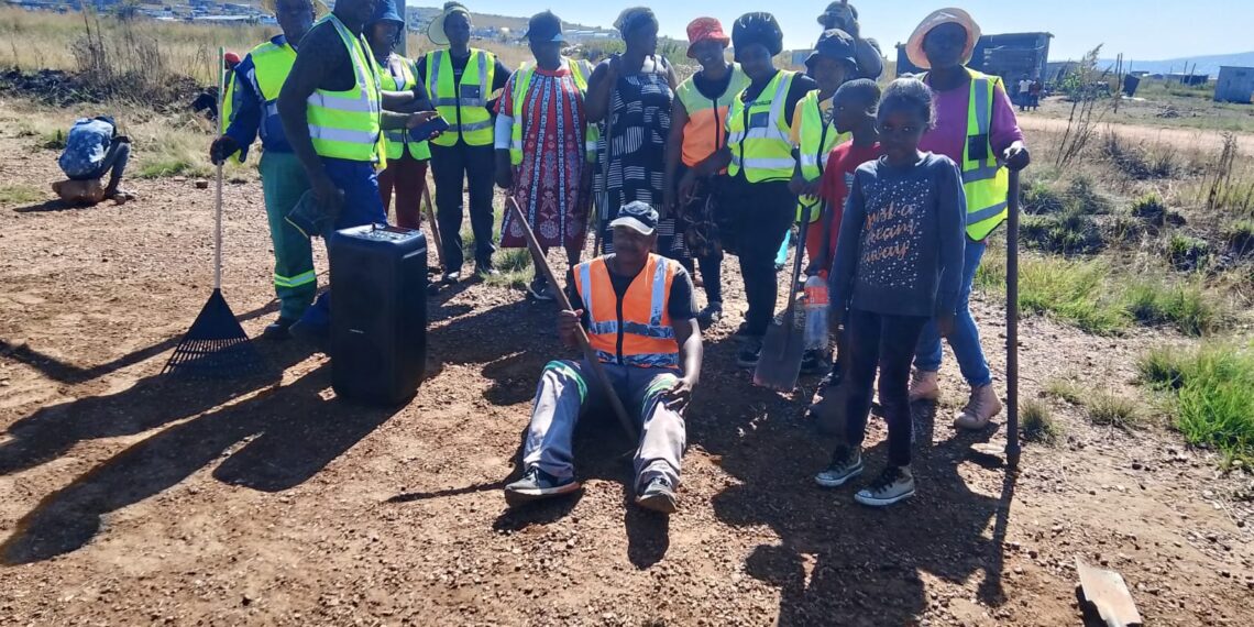 Community unites to reclaim sports field for children