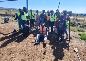 Community unites to reclaim sports field for children