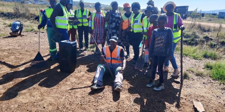 Community unites to reclaim sports field for children